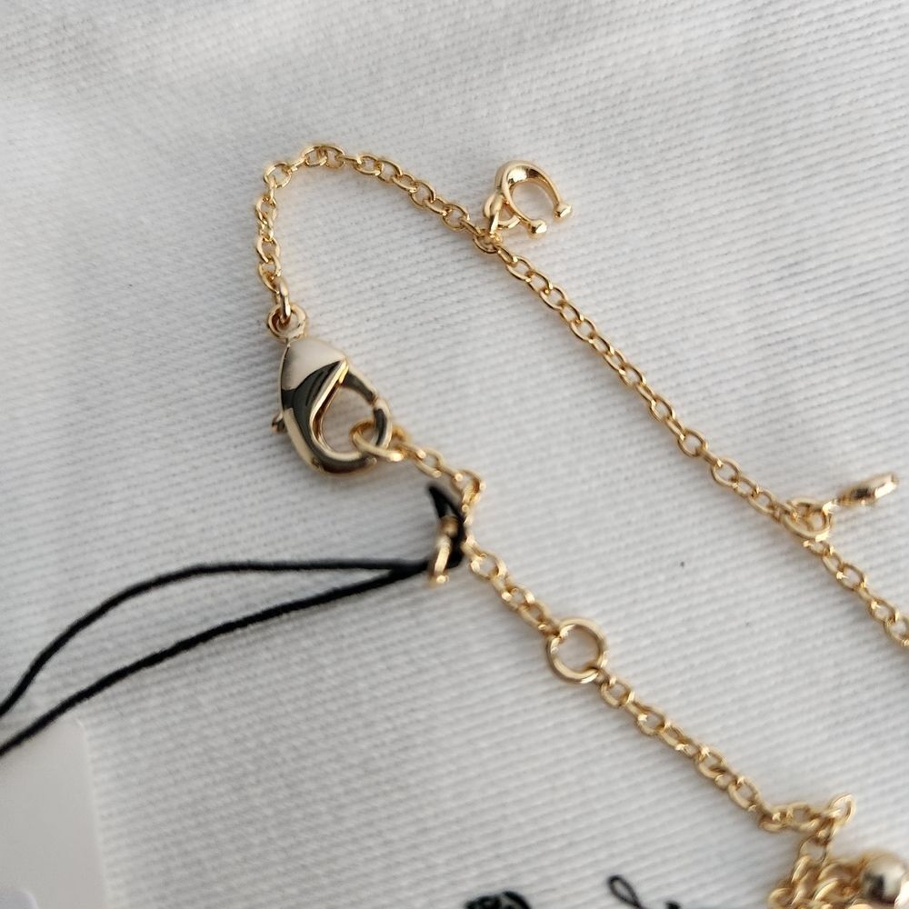 Coach Delicate Gold Charm Bracelet - Jewelry 14k Gold Plated Over Brass - Picture 5 of 9